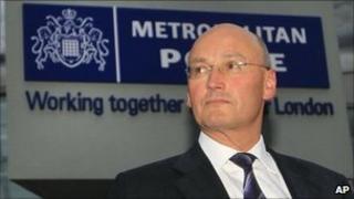 Sir Paul Stephenson standing outside Scotland Yard