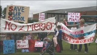 Parents and pupils protesting over plans to merge Ifton Heath primary - archive image