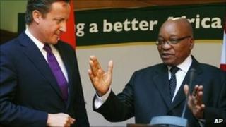 British Prime Minister David Cameron, left, holds a press conference with South African President Jacob Zuma