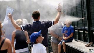 At Chicago's storied Wrigley Field baseball stadium on Sunday, mist cooled hot fans