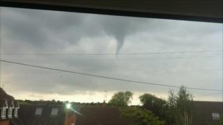 The funnel cloud was spotted over the village of Snitterfield, Warwickshire (Pic: Fiona Booth)