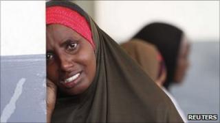 A Somali woman weeps for her dead child at Banadir hospital in Mogadishu, July 21, 2011.