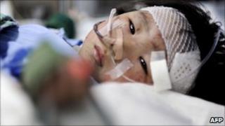 Injured child in hospital, 25 July
