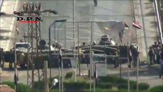 Amateur video purporting to show Syrian armoured vehicles on a bridge in Deir al-Zour (7 August 2011)