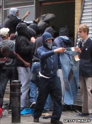 Youths loot a Carhartt store in Hackney on August 8