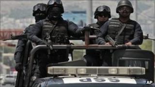 Federal police on patrol in Monterrey on 28 August