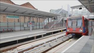 A DLR train pulling into the new Stratford International DLR station