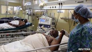 People injured in the bombing of the UN building in Abuja are treated in hospital, 28 August 2011