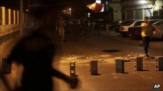 Bahraini youths protest against the government on the outskirts of Bahrain (29 August 2011)