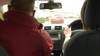 People sharing car journey