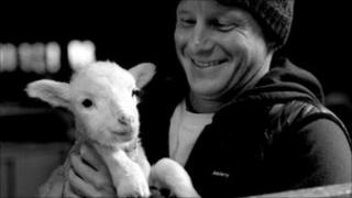 Tom Kay with a Bowmont lamb