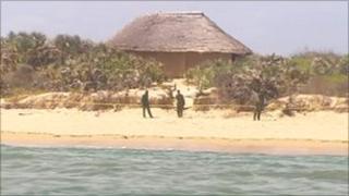 Soldiers patrol Kiwayu Safari Village