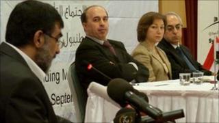 Syria's new national council is announced in Istanbul. From left: Imad Eldin Rashid, Ahmed Ramadan, Basma Kadmadi and Abdulbaset Sida.