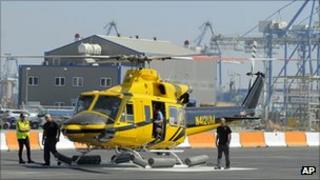 Helicopter ferrying workers to a Noble offshore oil and gas rig prepares to take off from Cyprus's Limassol port on 19 September 2011