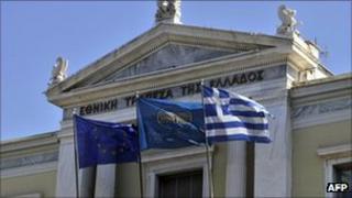 EU, National Bank and Greek flags in front of the National Bank of Greece