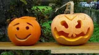 Two jack-o-lanterns made from pumpkins