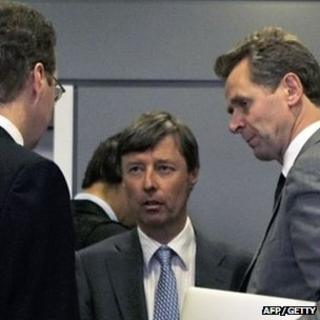 International Monetary Fund's Paul Thomsen (R) talks with European Commission official Matthias Mors (C) and another troika official after their meeting with Greek Finance Minister Evangelos Venizelos in Athens on 30 September 2011