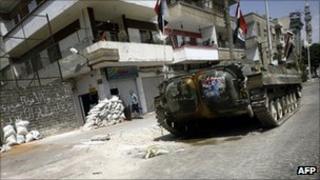 File image of a Syrian military tank in Homs, 160 km northeast of Damascus, August 2011