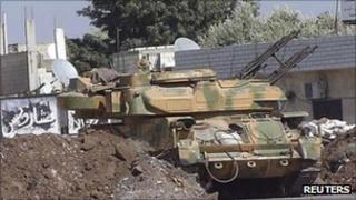 Syrian armoured vehicle at Hula town near Homs, 30 September 2011