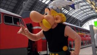 A person in Asterix costume at Frankfurt train station