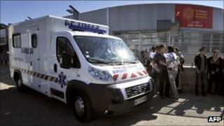 An emergency vehicle is parked in front of Jean Moulin high school in Beziers, southern France, after maths teacher set herself on fire in the high school playground on Thursday