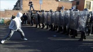 Rioter attacks police