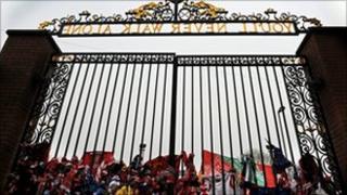 Football scarves tied to the Shankly Gates at Anfield