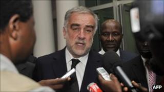 The International Criminal Court"s chief prosecutor, Luis Moreno-Ocampo (L) at the Prime Minister's residence in Abidjan on October 14, 2011.