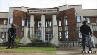 Riot police in front of Liberia's National Elections Commission building