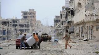 Sirte residents return to find their homes destroyed