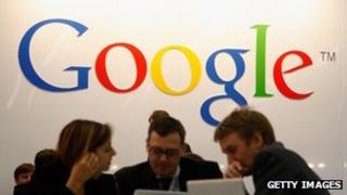 Visitors below a Google banner at the Frankfurt Book Fair