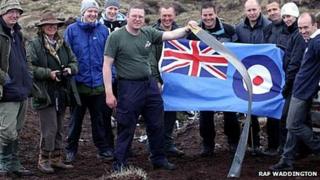 Wreck recovery team with part of a propeller. Pic: RAF Waddington