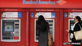 Customers at a Bank of America ATM 21 January 2011