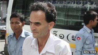 James D'Agostino arrives for the hearing of his verdict at the Phnom Penh Municipal Court 4 November 2011