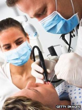 A dentist at work