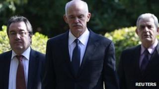 Greek PM George Papandreou at the presidential palace in Athens (5 Nov 2011)