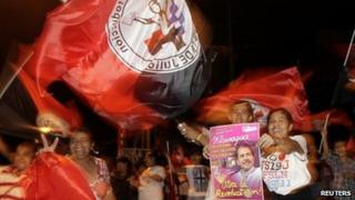 Supporters of Daniel Ortega take to the streets of Managua to celebrate his expected victory