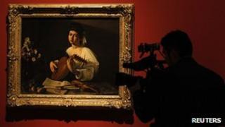 Cameraman films Caravaggio painting
