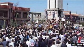 Demonstrators protesting against Syria"s President Bashar al-Assad gather in Hula, near Homs