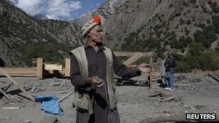 A village leader Palawan, 60, works on the reconstruction of a Kalash festival site in Grom village located in Rumbur Kalash valley October 12, 2011, as part of a project run by the Norwegian Chitral Integrated Area Development Organisation.