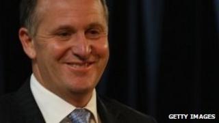 New Zealand Prime Minister John Key speaks during the Hellensville electorate "Meet the Candidates" meeting at Whenuapai Primary School on November 9