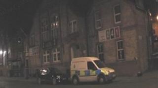 Police van outside the Asia restaurant