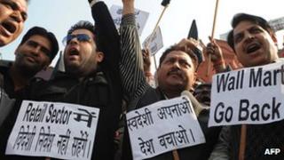 Protesters hold anti-FDI banners in India