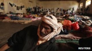 Suspected loyalist of Muammar Gaddafi inside a jail in Tripoli on 17 November 2011