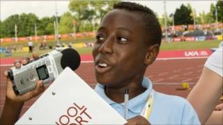 A School Reporter recording audio