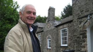 David Rowley outside Llanrhos Old School