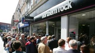 SEPTEMBER 15 2007: Customers of Northern Rock queue outside the Kingston branch