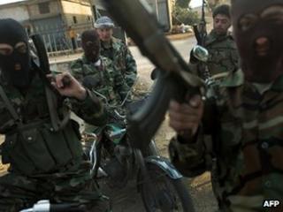 Soldiers of the Free Syrian Army, formed by army deserters, 7 December
