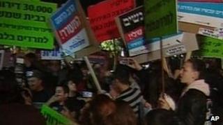 Protesters gather outside the Orot Girls School in Beit Shemesh, 27 December 2011