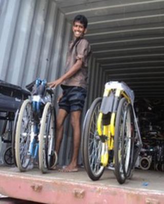 Consignment of PhysioNet charity wheelchairs being unloaded in Sri Lanka